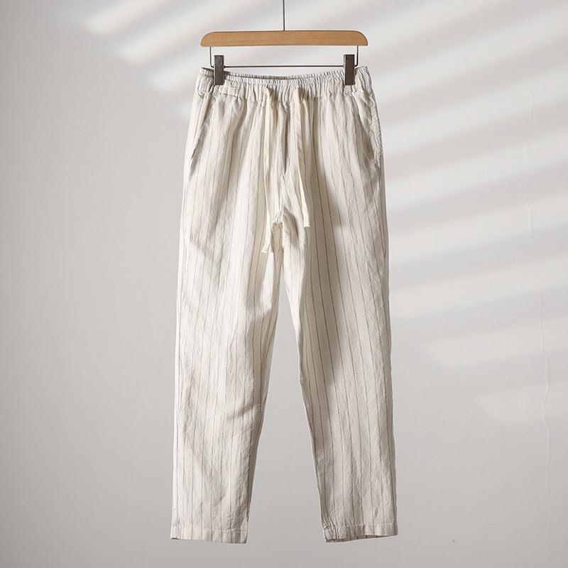 Calça de Linho Listrada Montelezzi ML008, confeccionada em linho nobre, estampa discreta e modelagem refinada para um visual sofisticado.